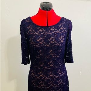 Purple knee length lace dress